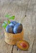 basket with plums