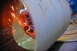 naval welder with protective mask welding metal 
