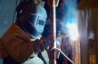 a welder working at shipyard
