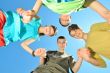 Four children against the sky