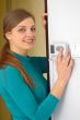 young hand with digital climate control