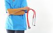 Female doctor holding stethoscope
