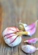 young garlics on wooden background