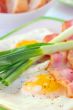  breakfast with bacon and fried eggs