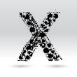 Letter X formed by inkblots