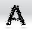 Letter A formed by inkblots