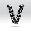 Letter V formed by inkblots