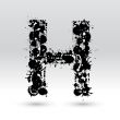 Letter H formed by inkblots