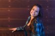Mixed Race Young Adult Woman Portrait Sitting on Wood Bench