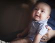 Cute Mixed Race Infant with Parents