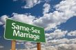 Same-Sex Marriage Green Road Sign and Clouds