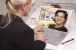 Woman In Kitchen Using Laptop Online Dating Search