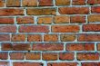 Fragment of a brick wall of an ancient building.