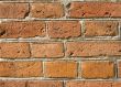 Fragment of a brick wall of an ancient building.