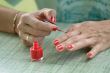 Woman Red Nail Polish