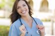 Young Adult Woman Doctor or Nurse Portrait Outside