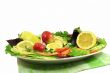 Vegetables and fruit platter. Presented on a white background.