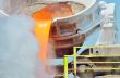The molten slag is poured from a cup 