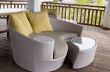 wicker sofa with pillow