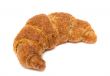 Fresh and tasty croissant over white background