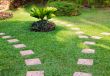 Stone path on green grass