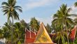 Thai house with palm trees