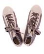 pair of fashionable sneakers on a white background. View from ab