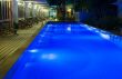 Pool and garden by night