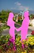 figurines of lovers in a botanical garden