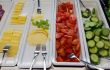 vegetables and cheese on the trays