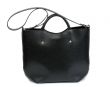 Elegant black female bag over white background