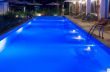 pretty swimming pool in night at a local resort