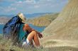 Girl looking at the mountains and the sea