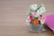 Decorative flower on wooden desk