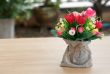 Decorative flower on wooden desk