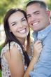 Mixed Race Romantic Couple Portrait in the Park