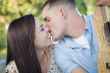 Mixed Race Couple Portrait with Guitar in Park