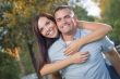 Mixed Race Romantic Couple Portrait in the Park