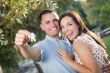 Happy Excited Couple with New House Keys