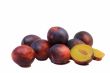 Large ripe plums on a white background.