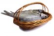 Salted and dried fish river in a basket on a white background.