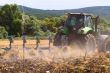 Tractor working on the field