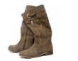 Women`s boots made of soft skin on a white background.