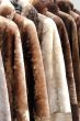 Coats made of natural fur for sale.
