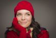 Mixed Race Woman Wearing Mittens Looks to Side
