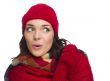 Mixed Race Woman Wearing Mittens and Hat Looks to Side
