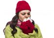 Sick Mixed Race Woman Blowing Her Sore Nose with Tissue