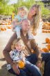Attractive Family Portrait at the Pumpkin Patch
