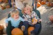 Young Family Enjoys a Day at the Pumpkin Patch