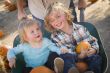 Young Family Enjoys a Day at the Pumpkin Patch